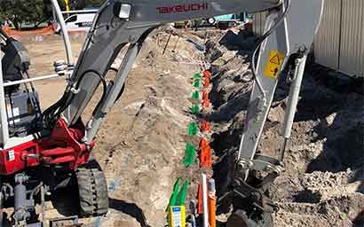 machine ploughing for sewage line